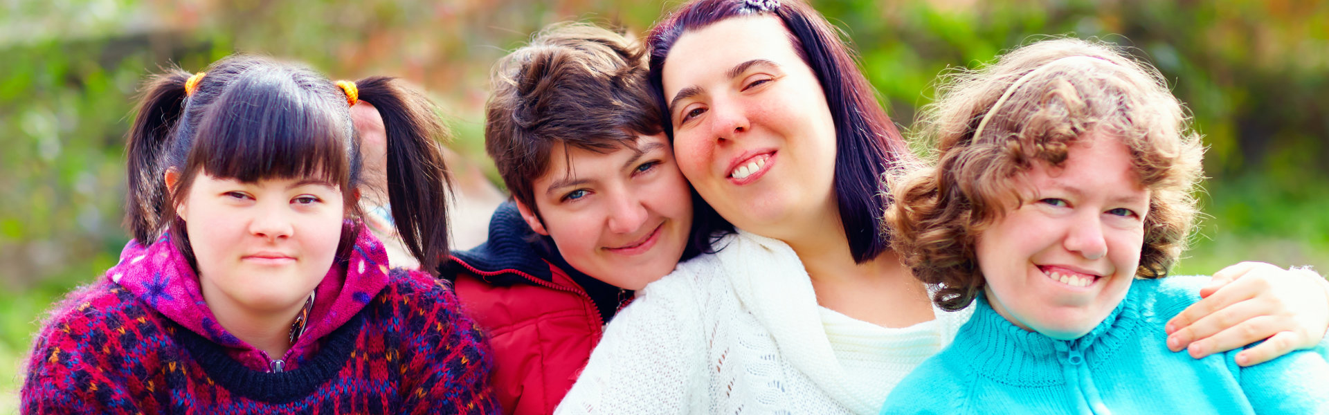 people smiling outdoors